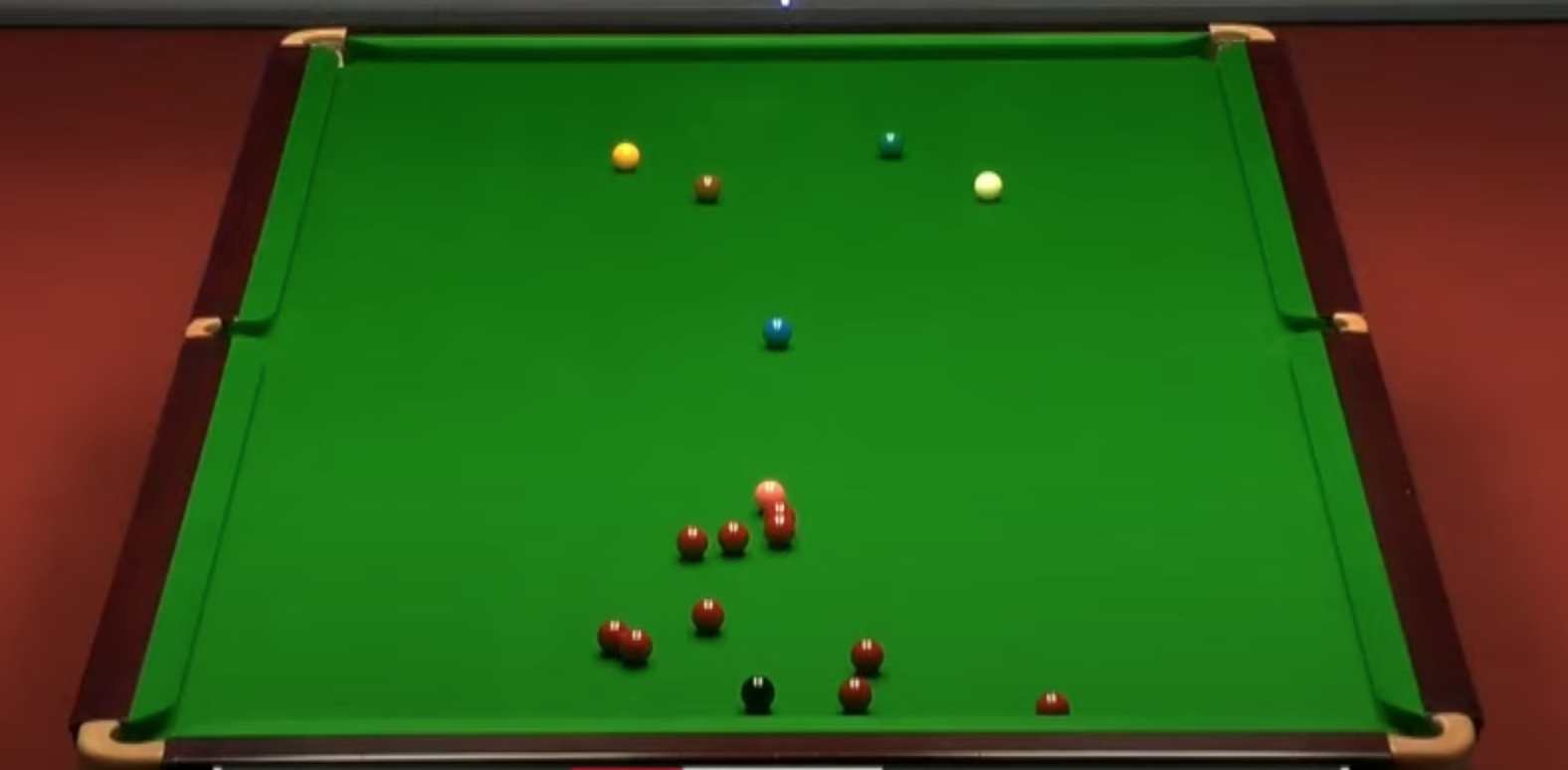 A snooker game in progress, the blue ball is centred, and the cue ball is to the top right.